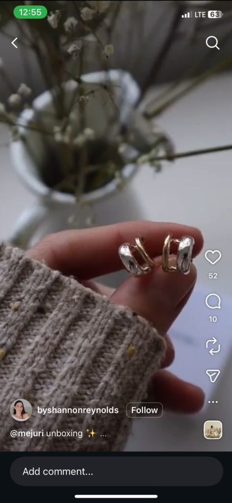 Instagram ad from creator byshannonreynolds featuring a Mejuri earring unboxing.