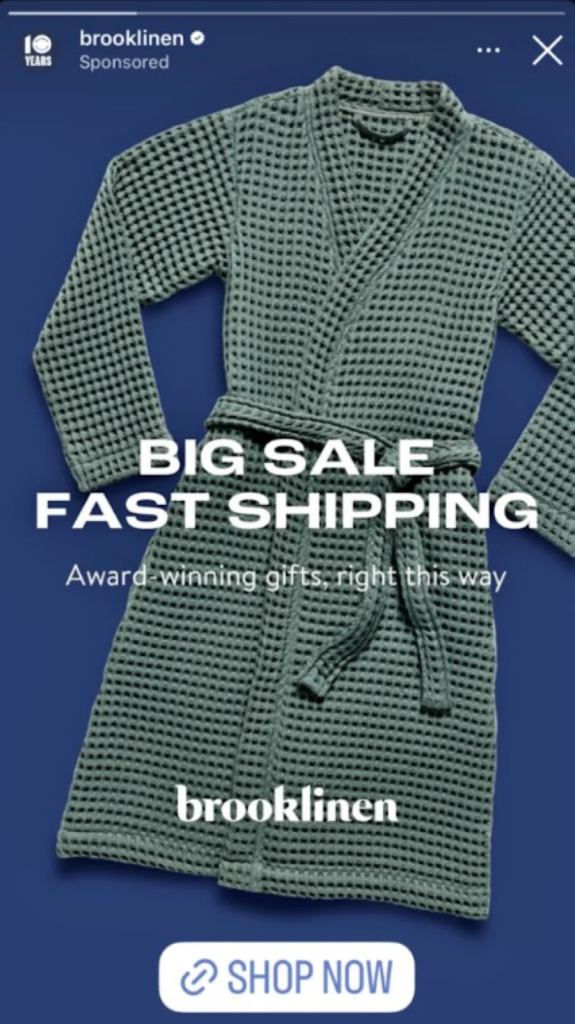 Brooklinen Story ad showing a green waffle-knit robe on a navy background with a big sale headline and Shop Now button.