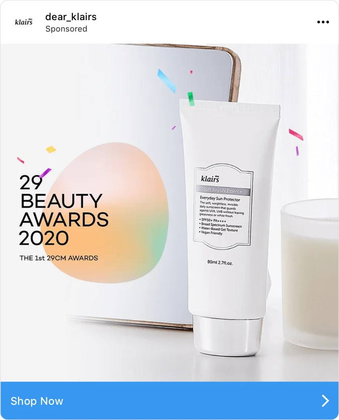 Instagram Feed ad from skincare brand Klairs featuring its sunscreen product and a Shop Now CTA.