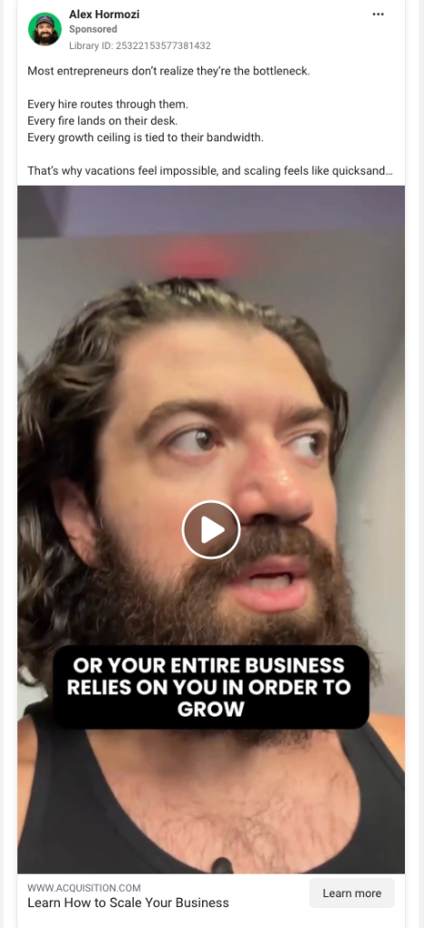 Alex Hormozi Facebook ad featuring a founder-led selfie video with subtitle text reading "Or your entire business relies on you in order to grow," a "Learn How to Scale Your Business" headline, and a Learn More CTA.