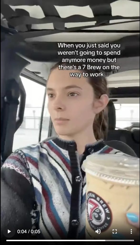 7 Brew TikTok UGC ad: a creator filming herself in a car holding a 7 Brew iced coffee, with a relatable on-screen caption, illustrating native, creator-style content boosted as a Spark Ad.