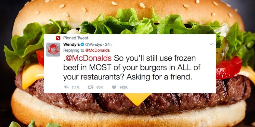 Pinned Wendy's tweet replying to McDonald's reading "So you'll still use frozen beef in MOST of your burgers in ALL of your restaurants? Asking for a friend." with 7.1K replies, 60K retweets, and 142K likes.