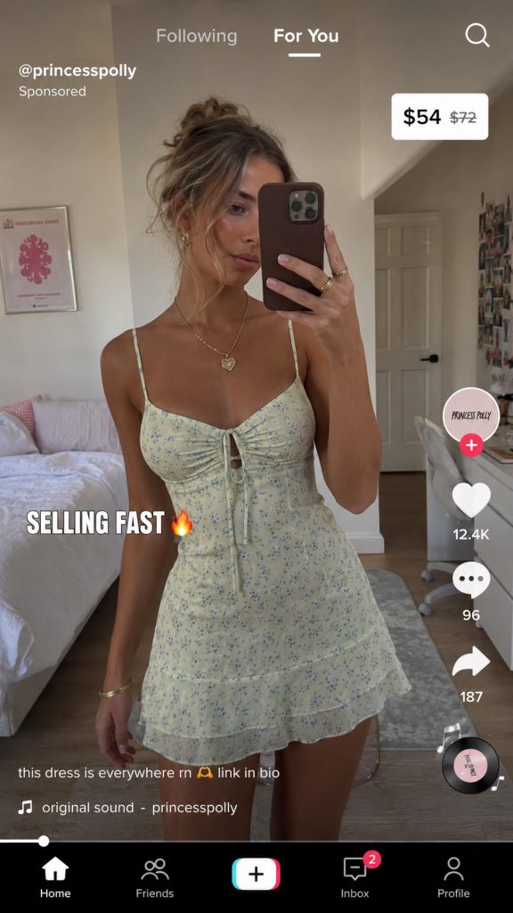 Princess Polly TikTok ad mockup showing a model in a floral mini dress with a $54 price tag and "Selling Fast" urgency overlay.