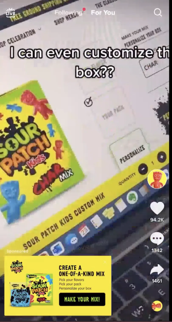 Sour Patch Kids tap-to-reveal Display Card TikTok ad: a "Create a one-of-a-kind mix / Make Your Mix!" card over a custom-box page, with on-screen text "I can even customize the box??"