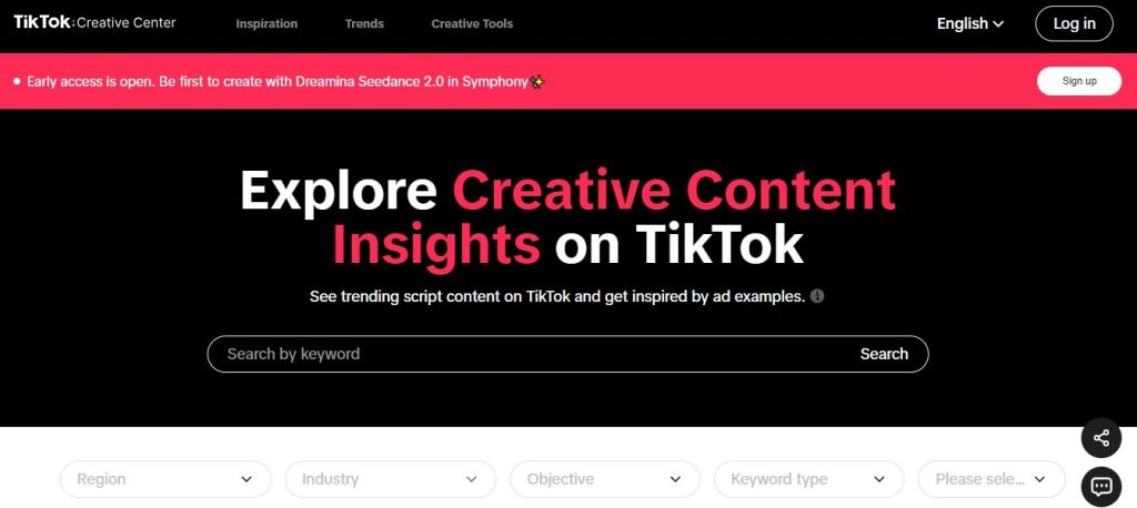 TikTok Creative Center landing page with a search bar and filters for Region, Industry, Objective, and Keyword type.