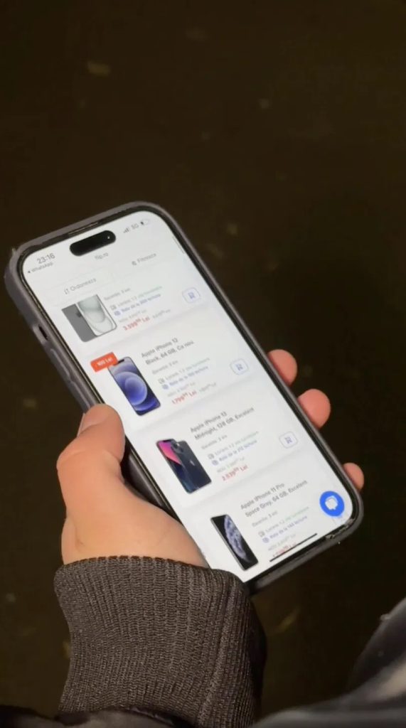 Flip.ro TikTok ad: a hand holding a phone showing the flip.ro site with refurbished iPhones and prices in Lei, illustrating the brand's Black Friday TopView and Top Feed campaign.