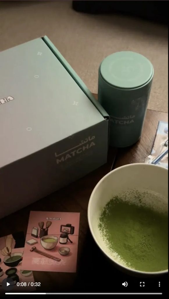 Omatcha TikTok ad: a branded matcha box and tin beside a freshly whisked bowl of matcha and a how-to card, illustrating a simple recipe/unboxing creative.