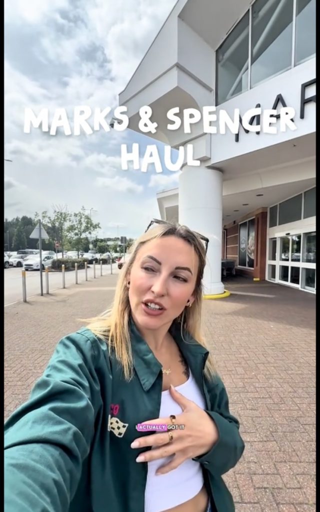 Woman filming herself for her Marks & Spencer's TikTok haul ad