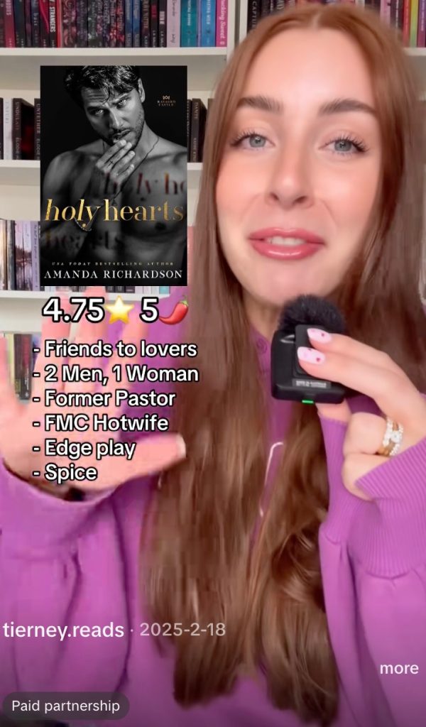 Woman in a TikTok ad holds a mic beside a book cover listing romance tropes and ratings.