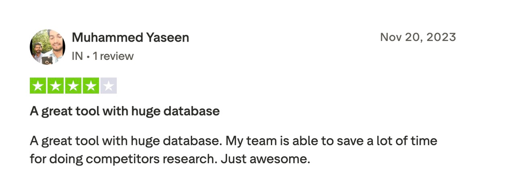 Four-star Trustpilot review of PowerAdSpy praising its large database for saving competitor research time.