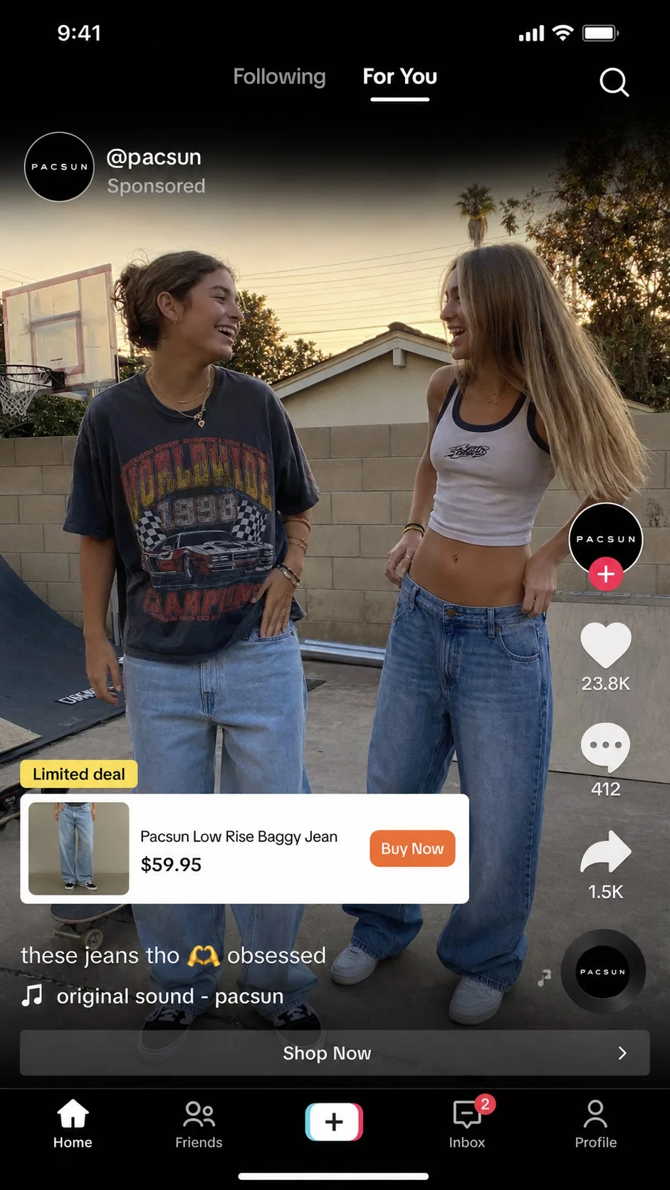 Pacsun TikTok ad mockup showing two Gen Z teens in baggy denim with a TikTok Shop product card overlay displaying "Pacsun Low Rise Baggy Jean $59.95" and an orange Buy Now button.