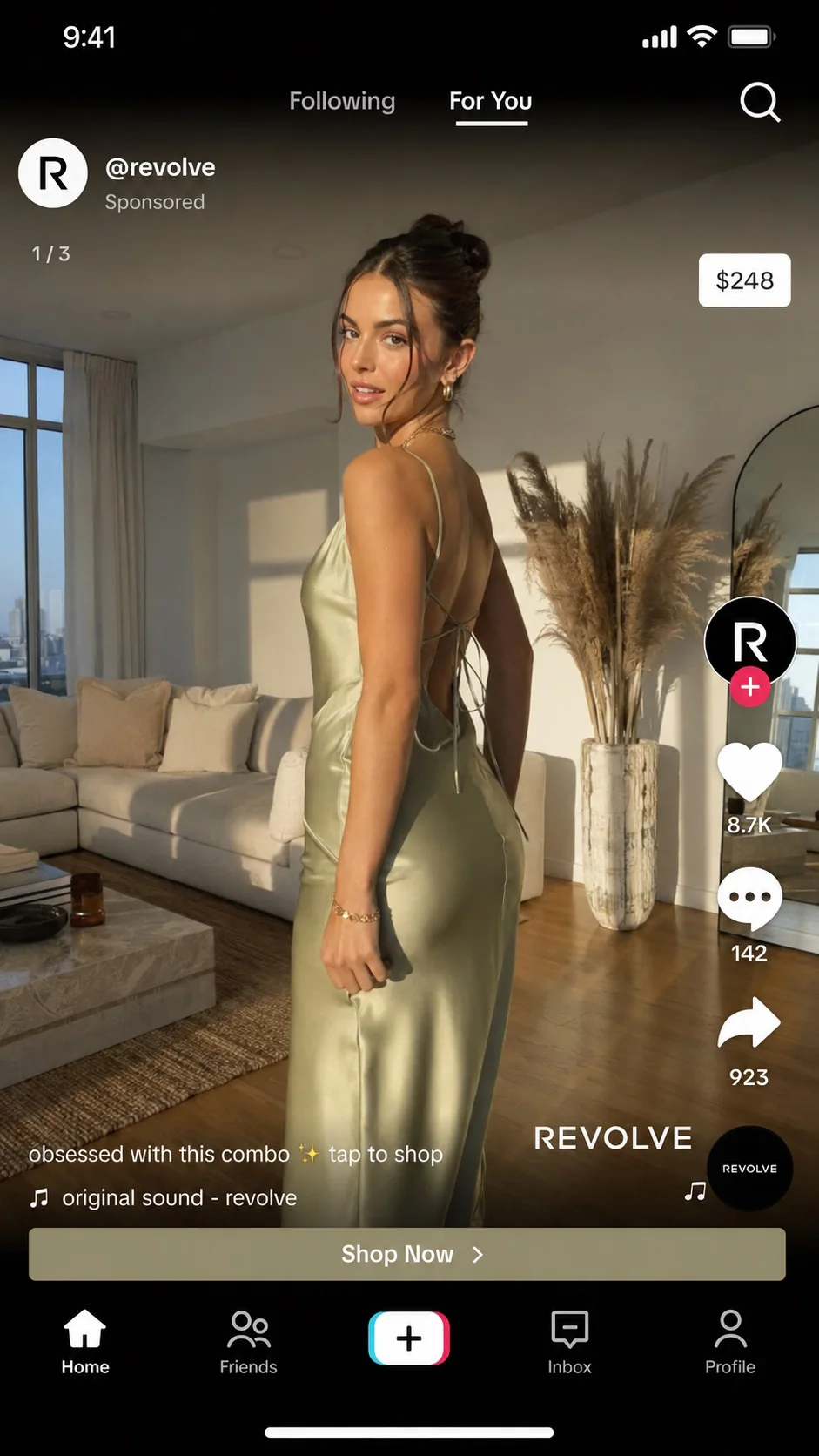 Revolve TikTok ad mockup showing a model in a sage silk slip dress with a $248 price tag, "1/3" carousel indicator, and REVOLVE watermark.