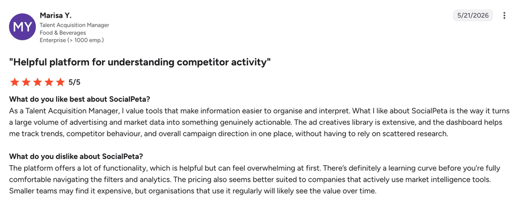 A 5-star G2 review praising SocialPeta's creative library and dashboards while noting a steep learning curve.