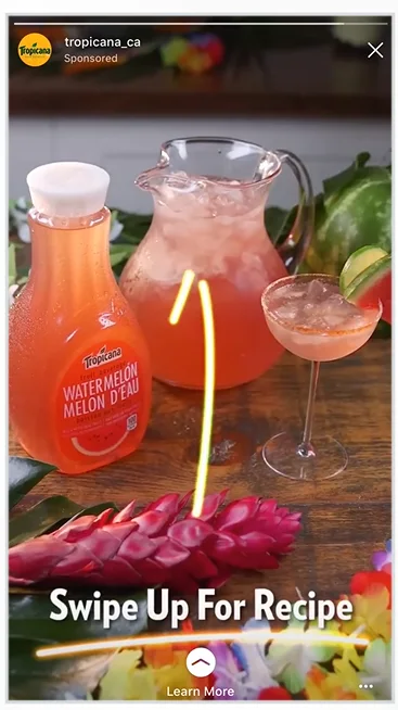 Tropicana Story ad featuring a watermelon juice bottle, pitcher, and cocktail glass with a recipe prompt.